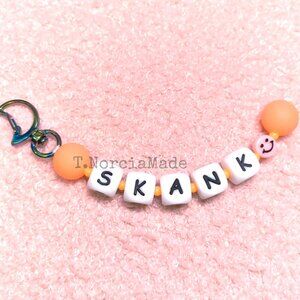 SK@NK: Silicone Offensive Keychain: Glow Orange